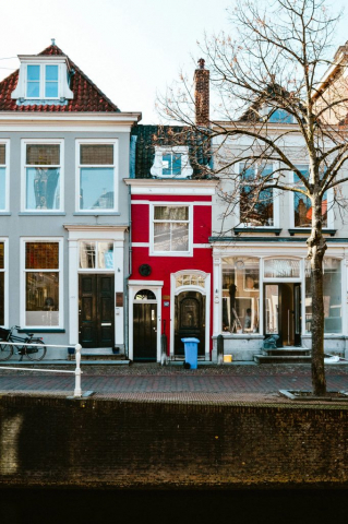 Delft-7 small red house duplex on canal